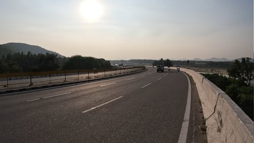 A Moving Cars and Motorcycles on the Road