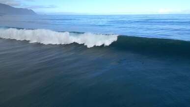 an aerial footage of big waves crashing on sea