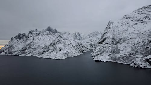 Snow Covered Mountains in the Ocean 