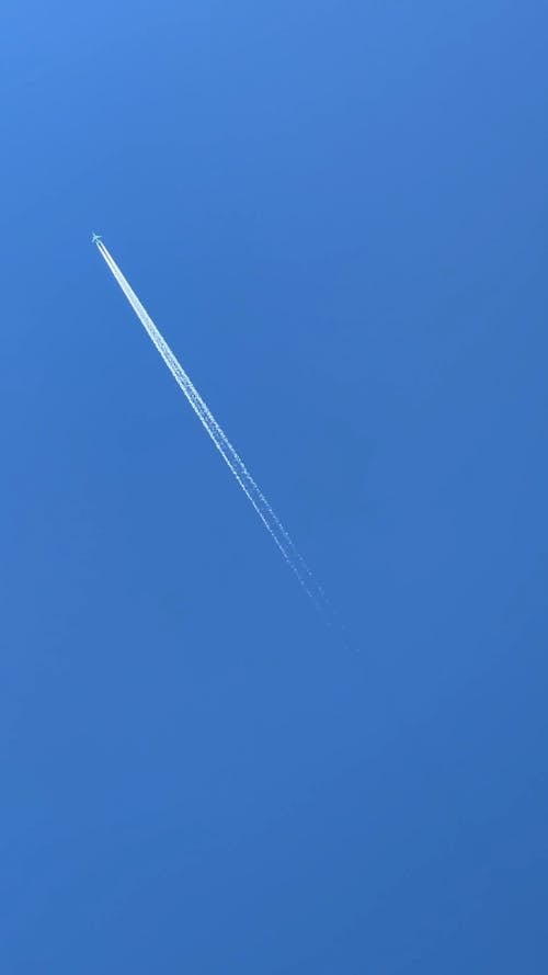 Jet Plane Flying on Blue Sky