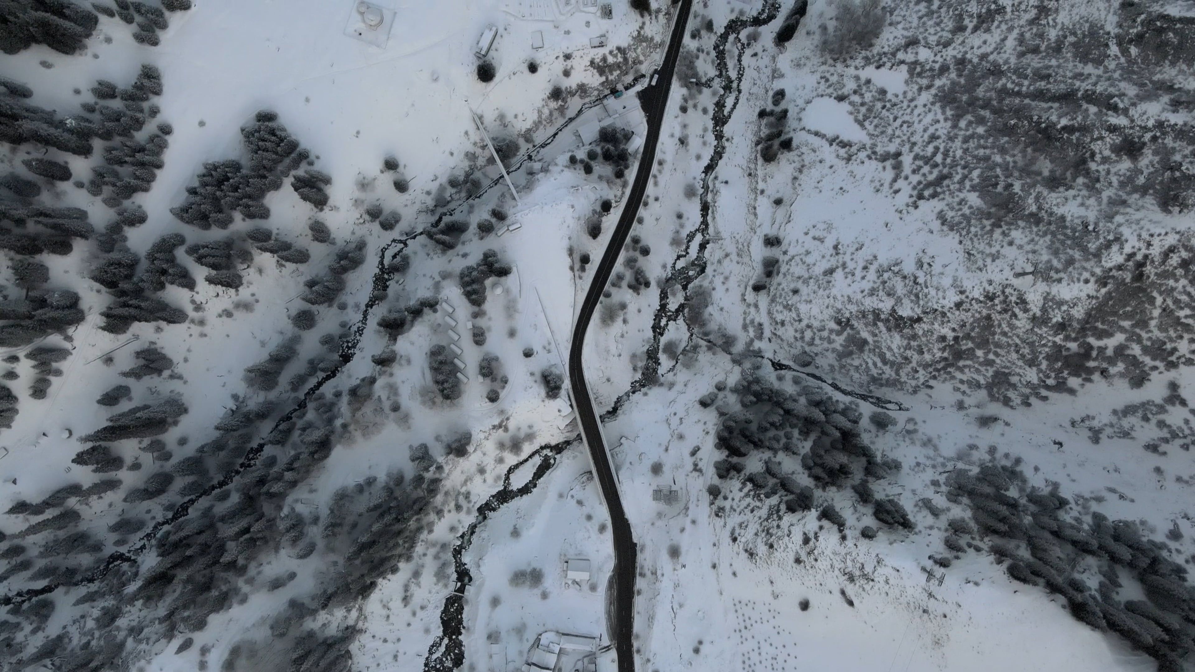 A Drone Footage of a Snow Covered Ground with Trees Free Stock Video ...