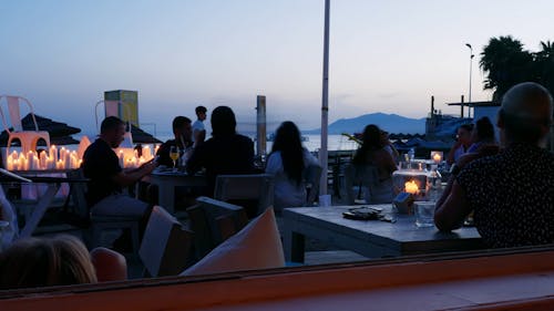 People Dining Al Fresco during Sundown