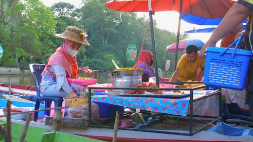 Merchants Selling Food by the River
