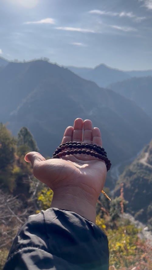 Prayer Beads Wrapped on a Person's Hand