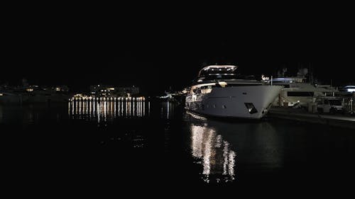A Yacht Moored at Port on a Dark Night 