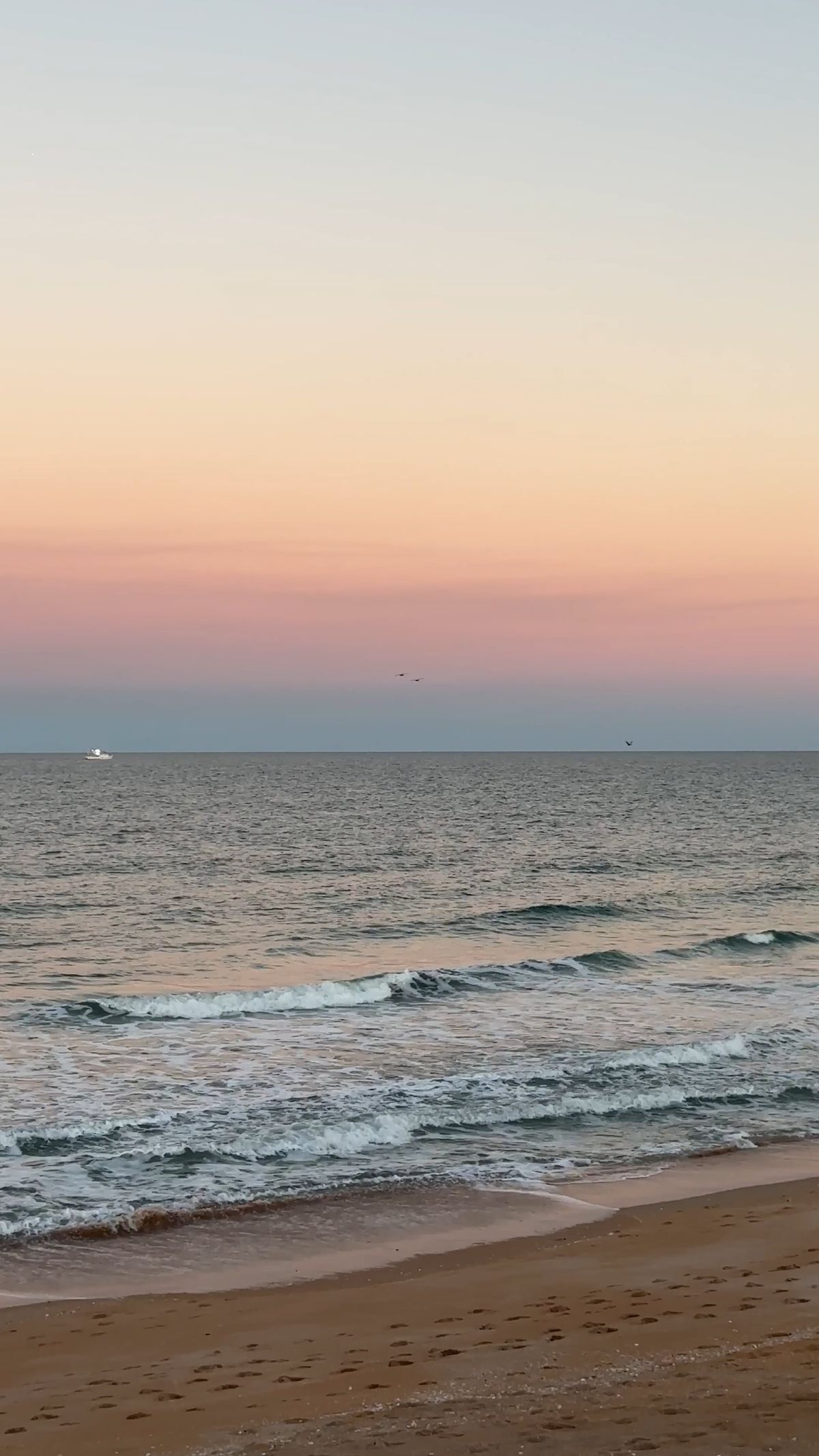 A pink and purple sunset over the ocean Free Stock Video Footage ...