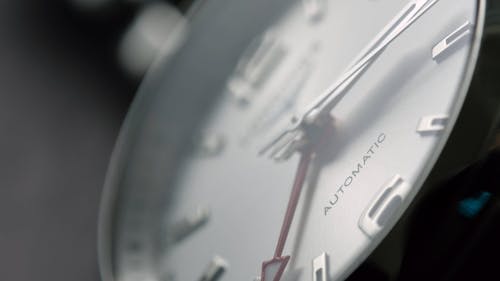 Extreme Close up View of a Silver Watch 