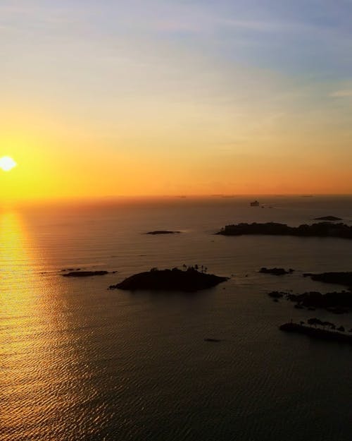 Drone Footage of a Golden Sunset over the Ocean 