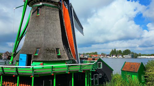 Drone Video of an Old Windmill by a Lake