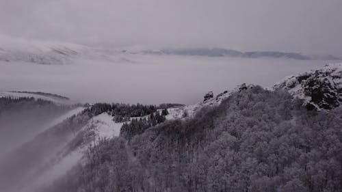 Drone Footage of a Snowy Mountain Landscape 