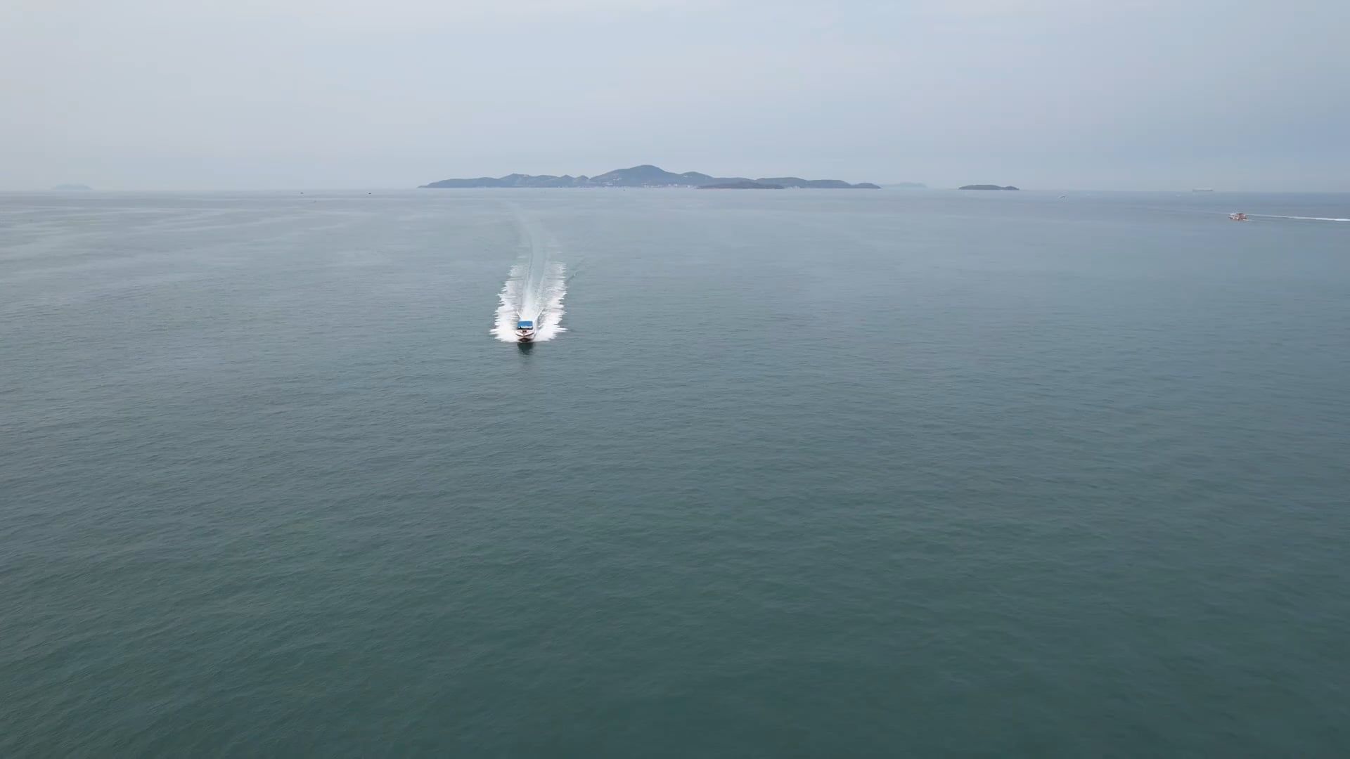 Drone View of a Motorboat Leaving a Trail on the Sea Surface Free Stock ...