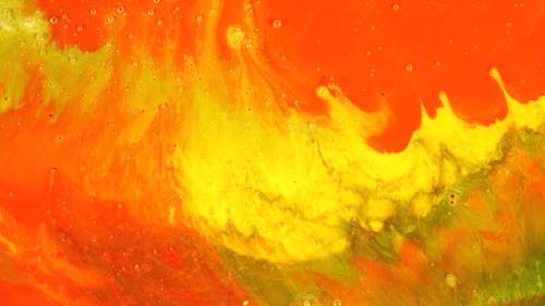 Red and Yellow Paint Mixing in Slow Motion 