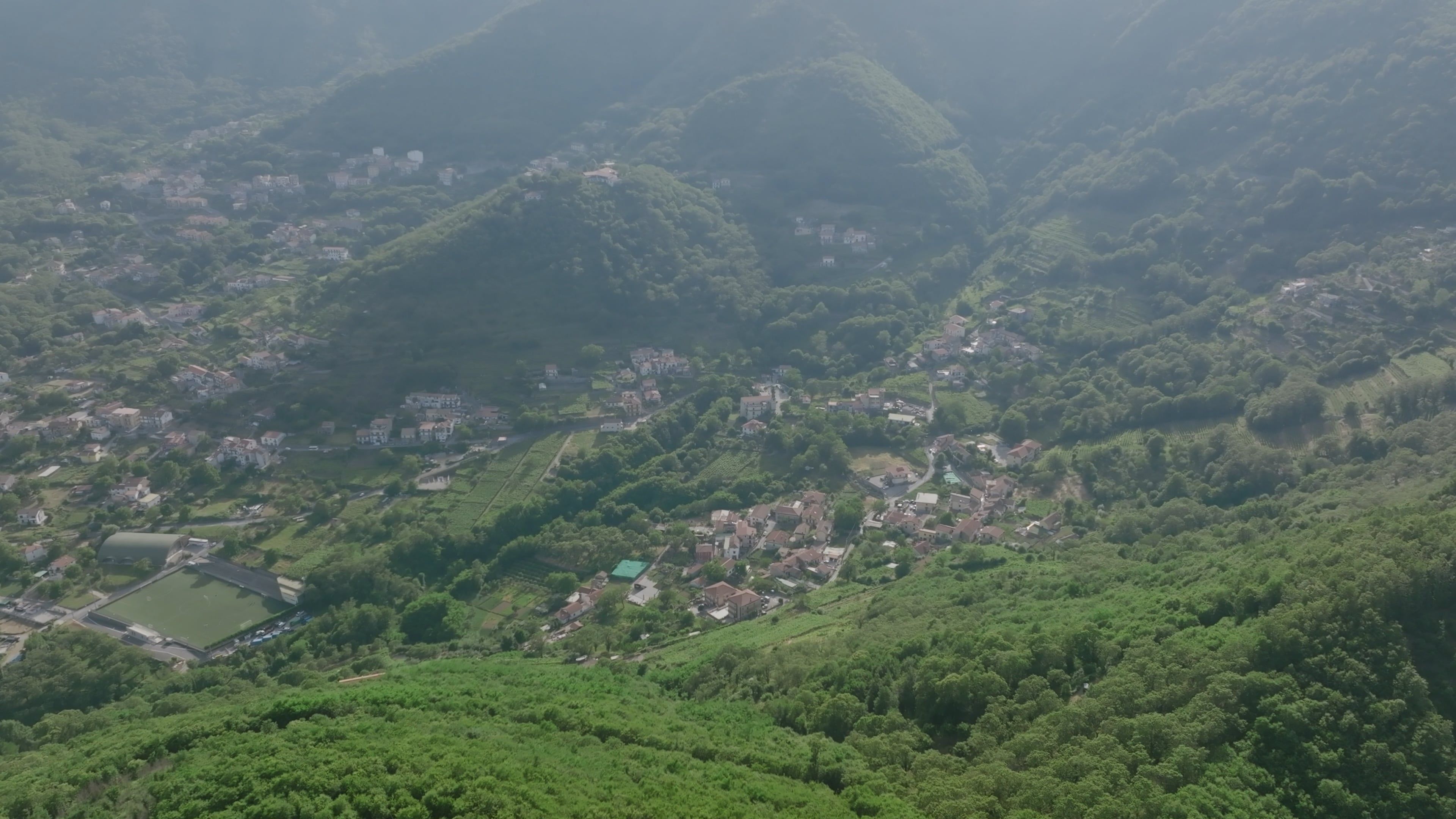Aerial View of a Town in a Mountain Valley Free Stock Video Footage ...