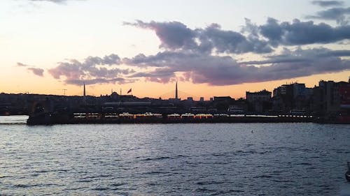 Drone Footage of a Ferry Boat near the Coast of Istanbul at Sunset 