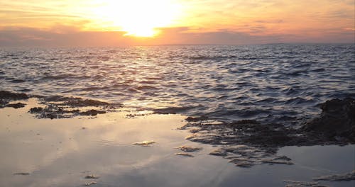 A Rocky Shore at Sunset 