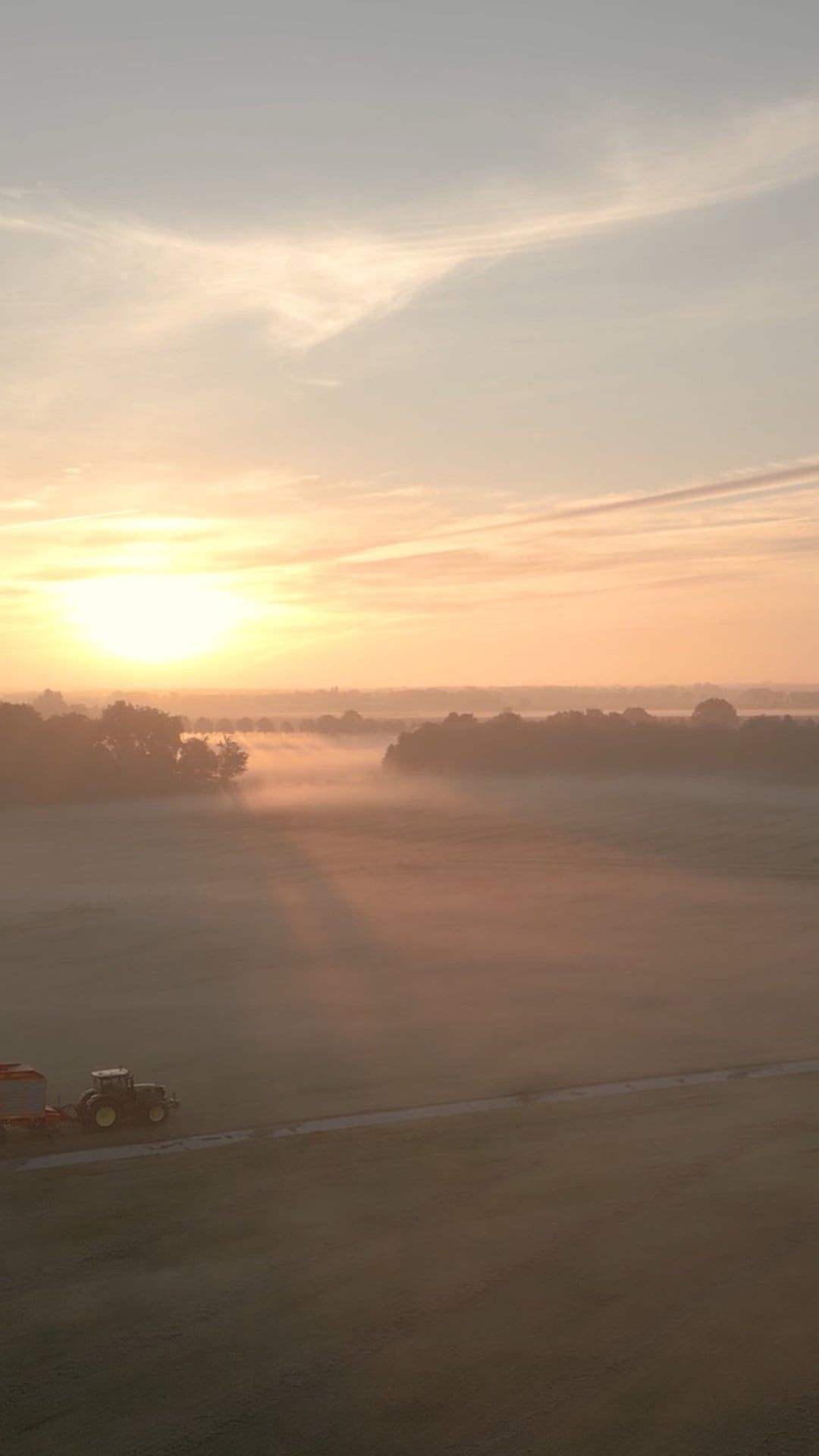 A sunrise over a field with a truck in it Free Stock Video Footage ...