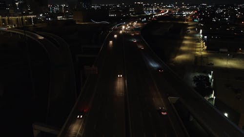 Drone Video of Night Traffic on a Highway Interchange