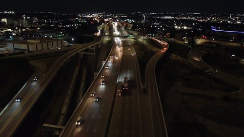 Drone View of Traffic on a City Highway at Night