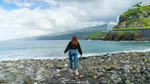 Back View of a Woman on the Beach in Puerto De la Cruz, Tenerife