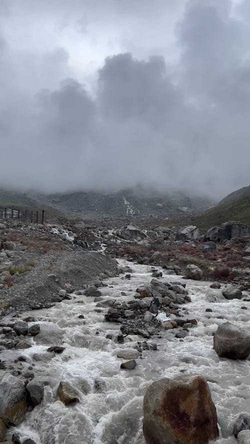 A Flowing River in a Mountain Area