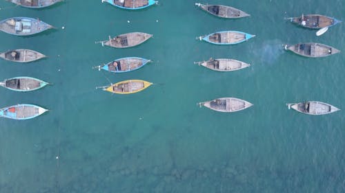 Top View of Wooden Boats Moored on Calm Sea Waters