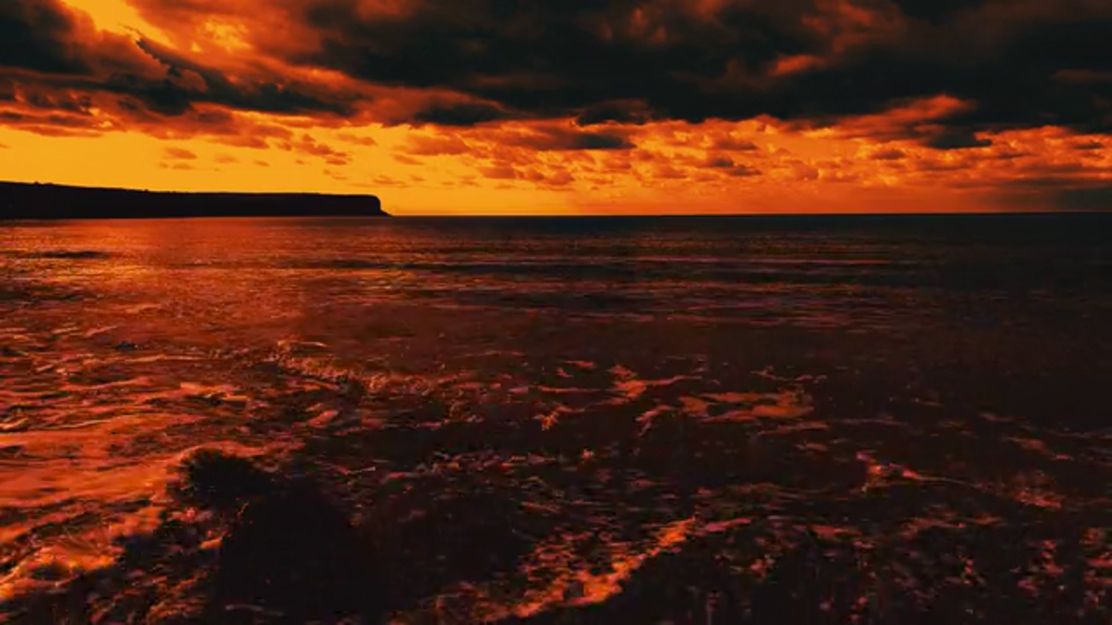 A sunset over the ocean with clouds and water Free Stock Video Footage ...