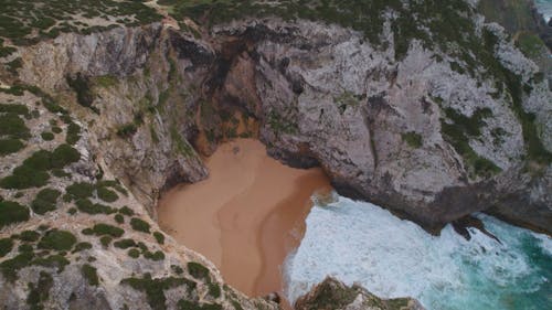 Drone Video of a Hidden Sandy Beach on the Coast of Portugal