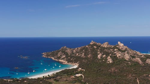 Drone View of Coastal Mountains and Sandy Beaches on Corsica Island