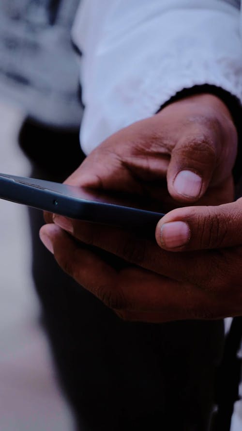 Close up View of a Person Using a Smartphone 