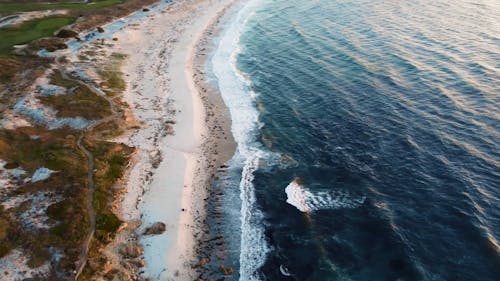 Aerial View of Sandy Beaches and a Golf Course on the Coast of Monterey, California 