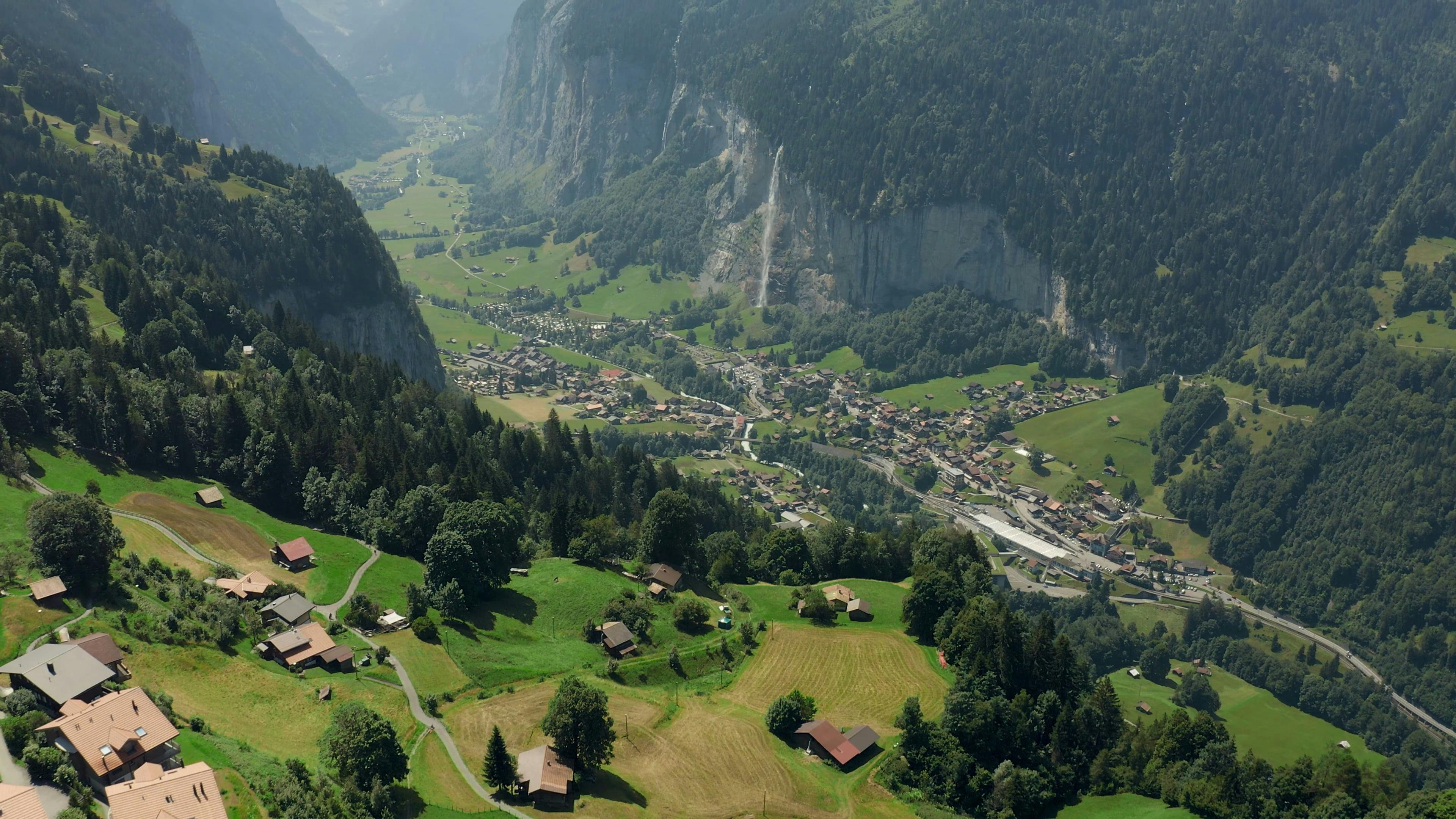A valley with a village in the middle of it Free Stock Video Footage