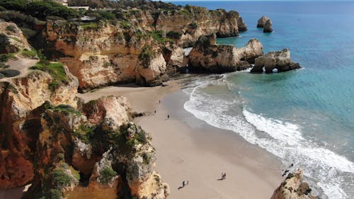 Drone Footage of Cliffs and a Sandy Beach on the Coast of Lagos, Portugal 