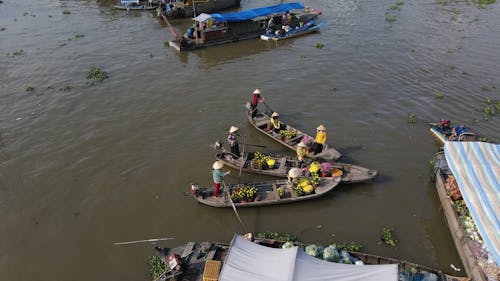 A Flower Floating Market on a Canal in Vietnam 