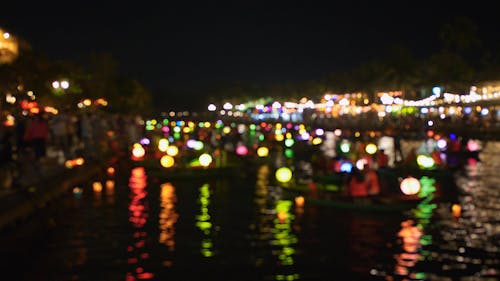 Blurry Footage of Boats with Colorful Lanterns on a River in Vietnam 