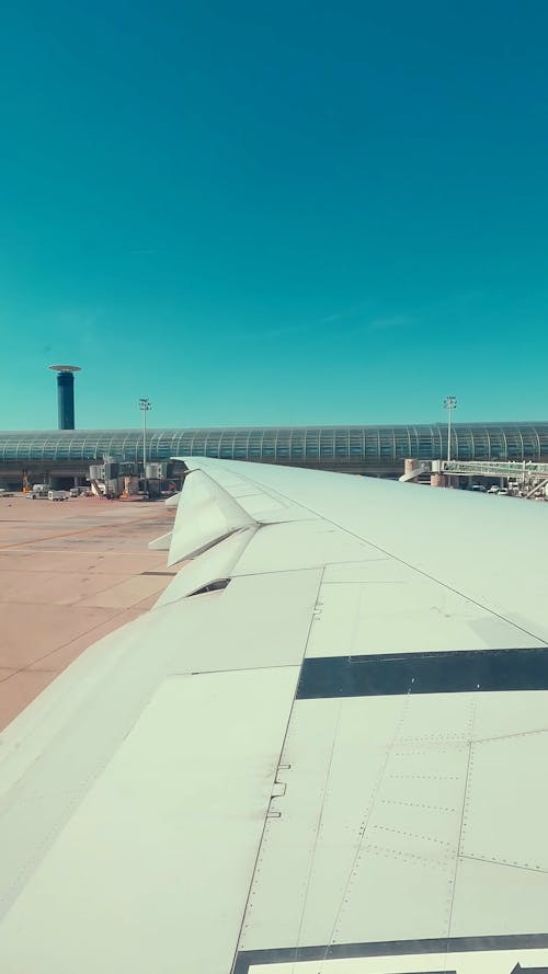 A Plane Taxiing on the Airport Runway 