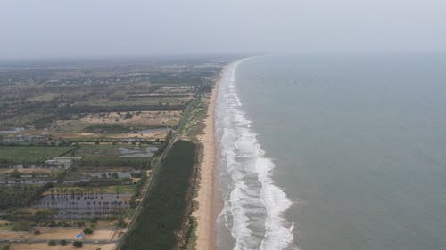 Aerial Footage of a Coastal Area with Sandy Beaches 