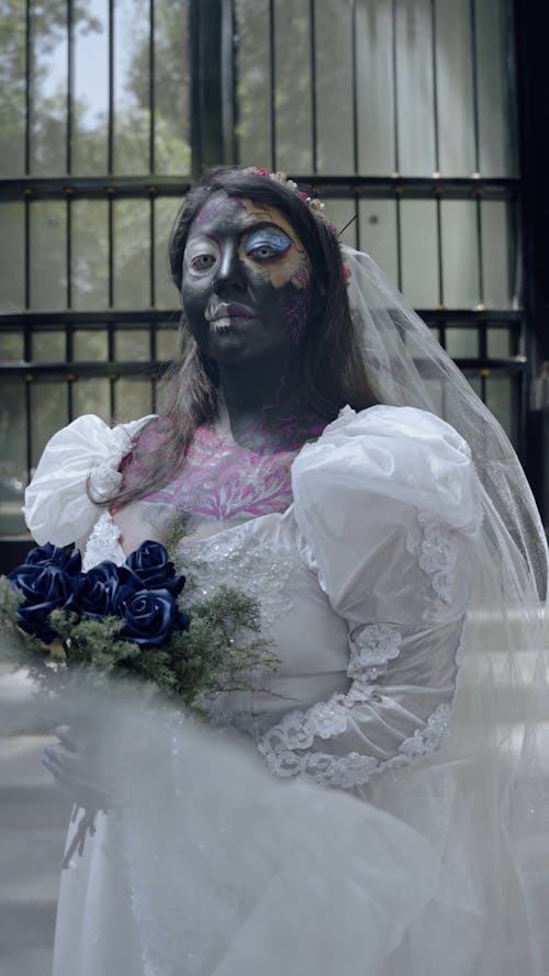 A Young Woman Dressed up as a Zombie Bride