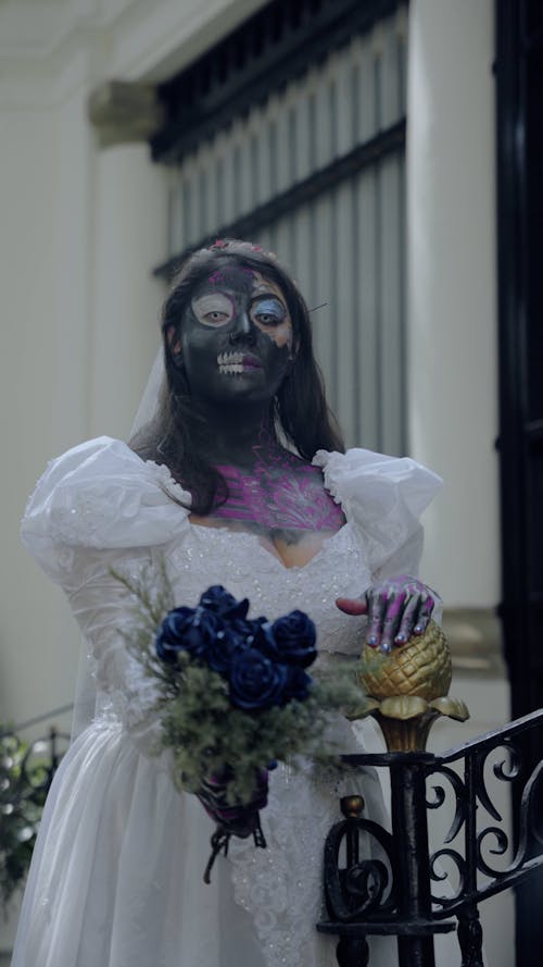 A Young Woman in a Zombie Bride Costume 