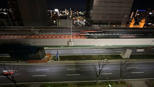 Time Lapse of Night Traffic on a City Highway 