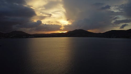 Coastal Mountains under a Dramatic Sunset Sky