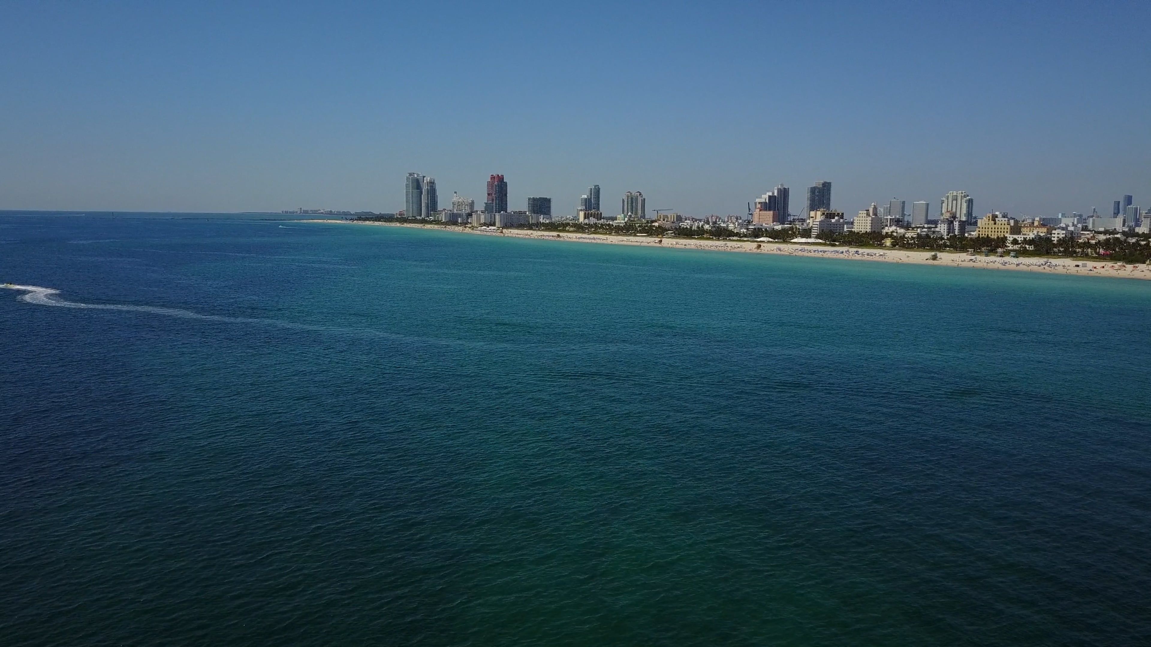 The beach and city skyline from an aerial view Free Stock Video Footage ...