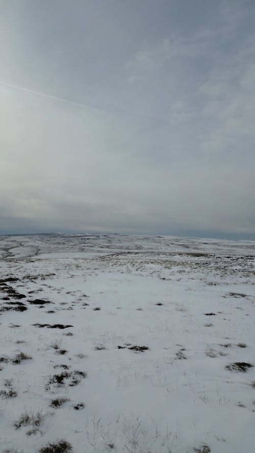 Drone Footage of a Snow Covered Landscape 