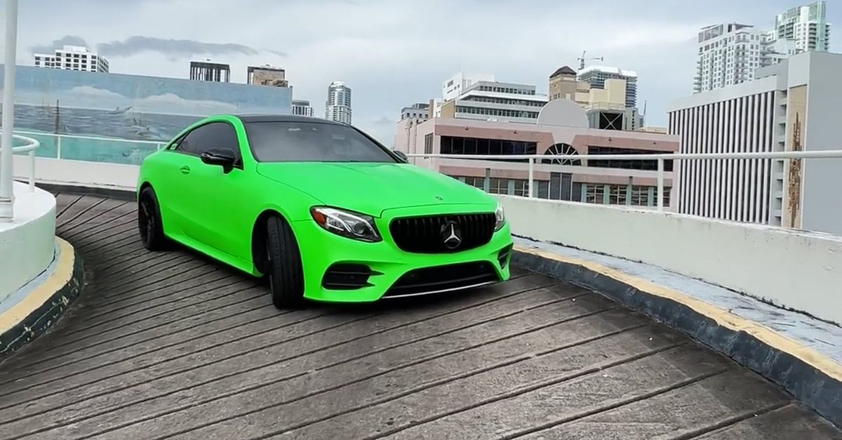 Mercedece In Ramp A Green Mercedes Benz Driving on a Parking Garage Ramp Free Stock Video ...