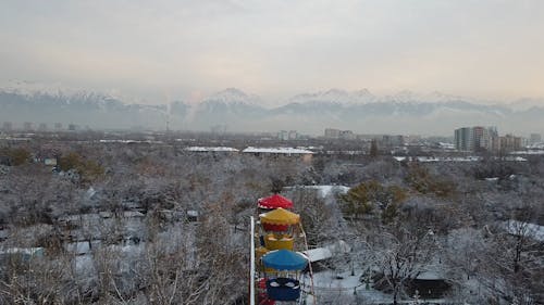 Drone Footage of a Snow Covered Amusement Park in the City of Almaty, Kazakhstan
