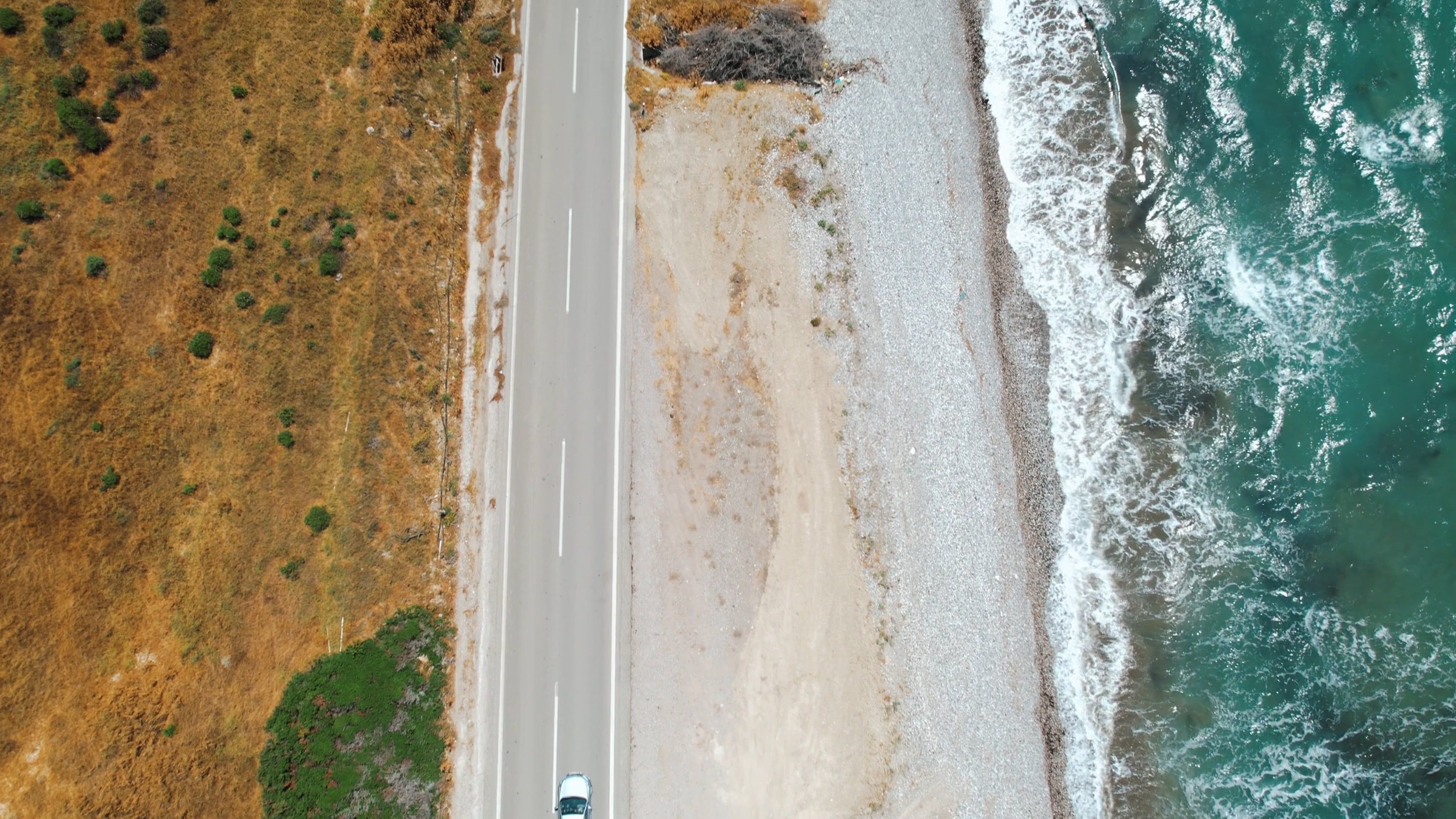 Coastline shot with Drone with Car passing by Free Stock Video Footage ...