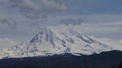 Time Lapse of Moving Clouds over Mount Rainier in Washington, USA