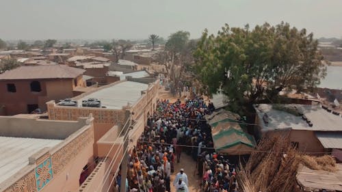 Drone Footage of a Crowded Street in a Small Town 