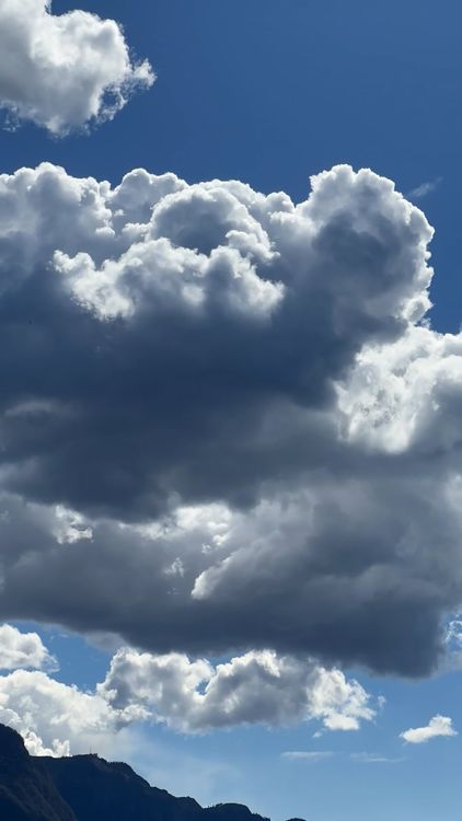 A photo of clouds over a mountain range Free Stock Video Footage ...