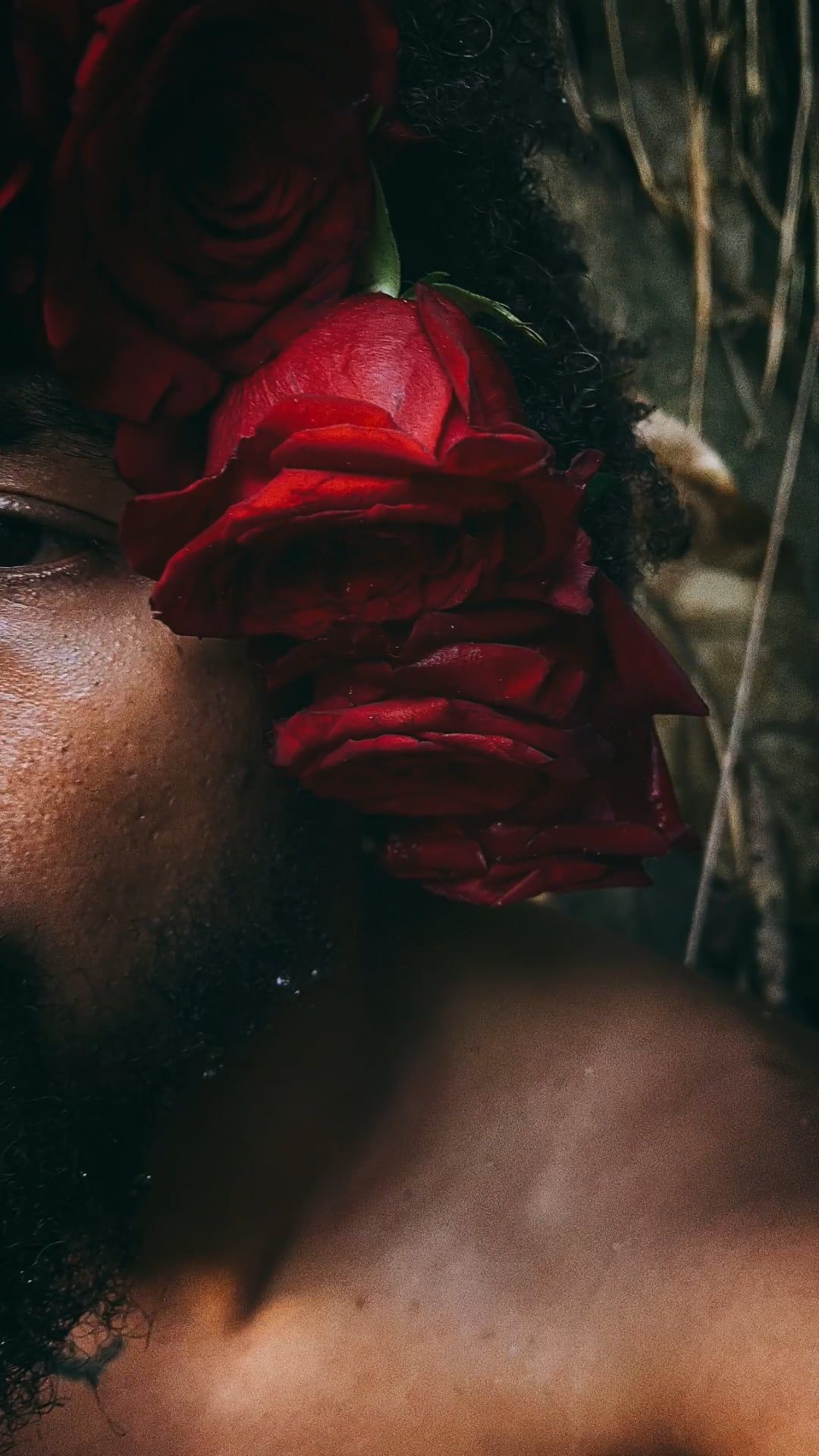 A Shirtless Man Posing with Flowers in his Hair Free Stock Video ...