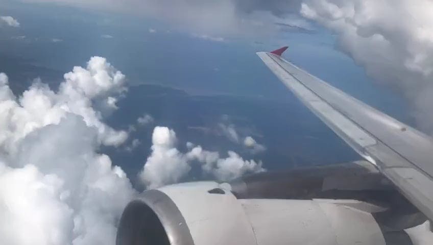 Airplane Traveling Through Clouds · Free Stock Video